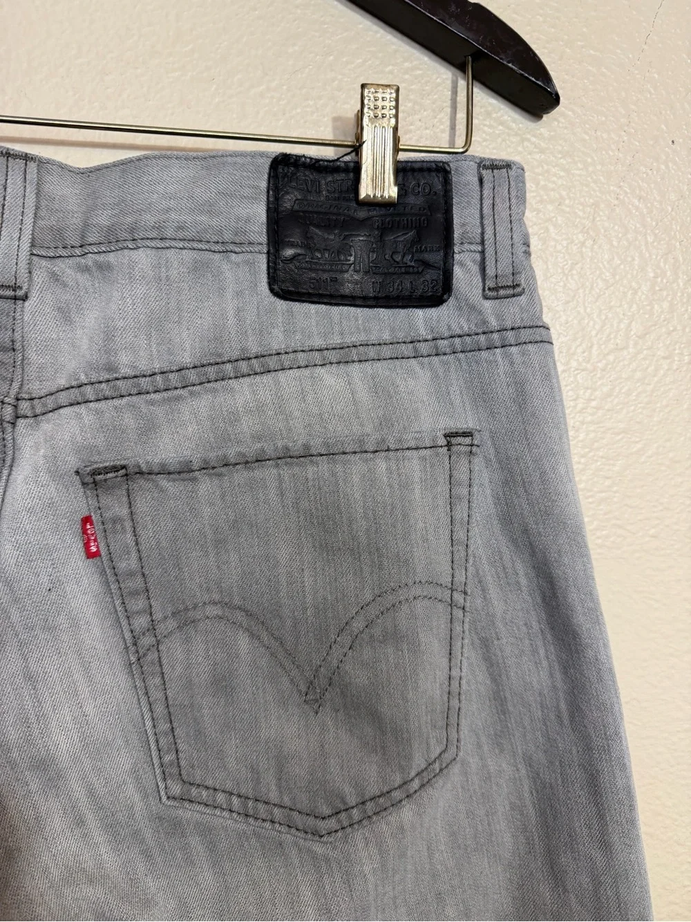 Levi's 511 Slim Fit jeans in a faded light grey wash.
